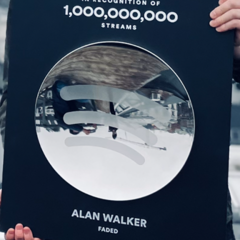 Which Artists Have Received the Spotify 1 Billion Streams Plaque?